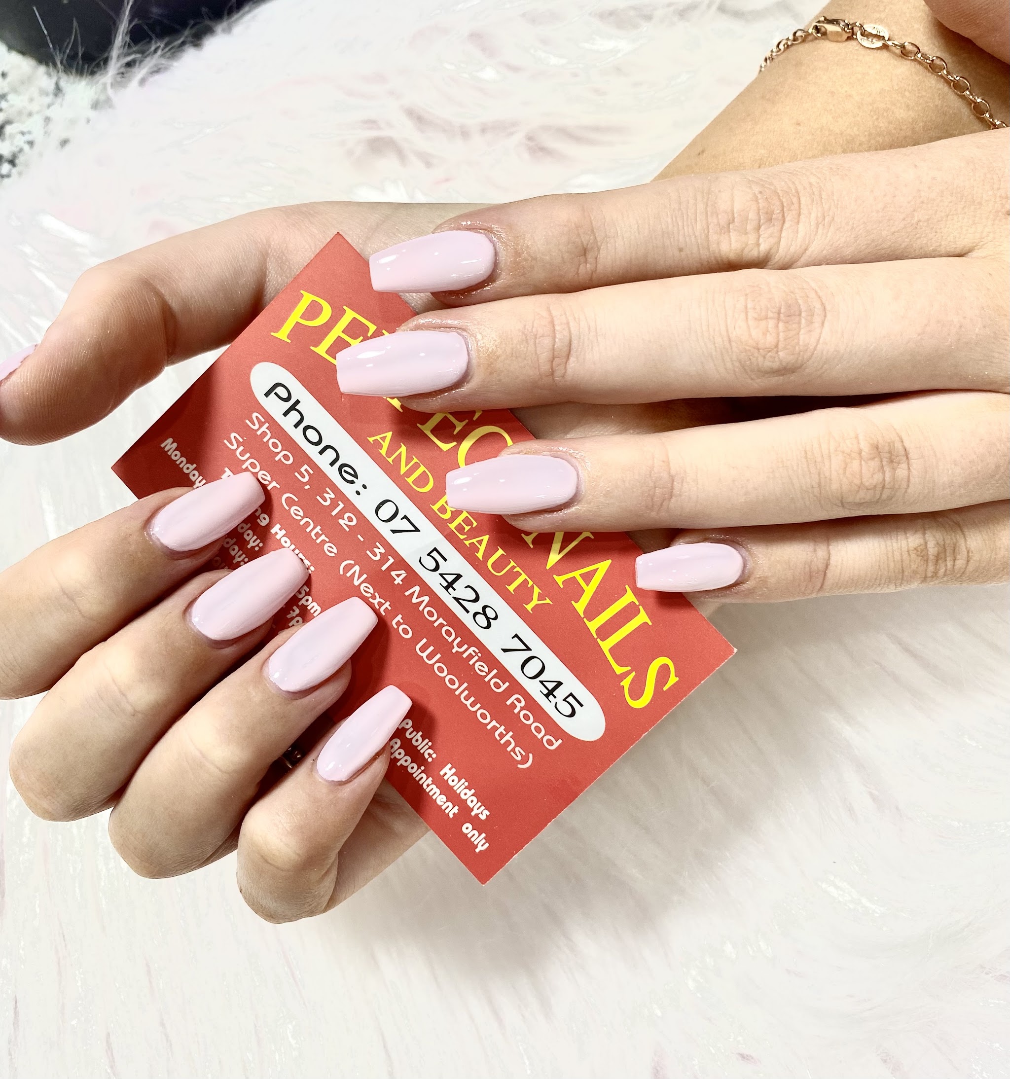 Soft pink glossy almond nails